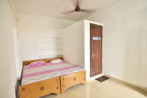 Double bedroom with bathroom in Ganges Paying Guest House